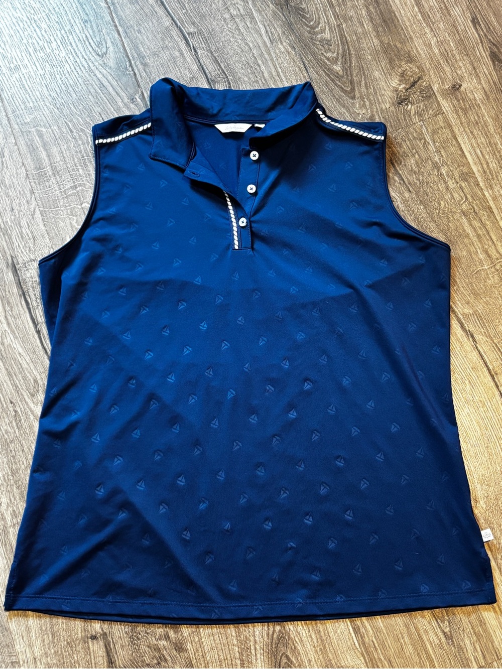 Lady Hagen Blue Sleeveless Polo with Subtle Motif